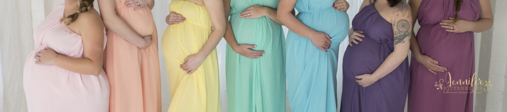 Rainbow Baby Mommies dressed in pastel colors of the rainbow while pregnant.