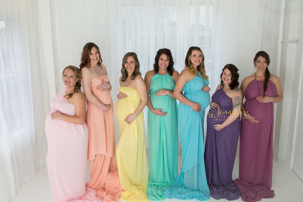 Rainbow Baby Mommies dressed in pastel colors of the rainbow while pregnant.